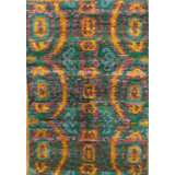 Vonshae Ikat Area Rug in Green