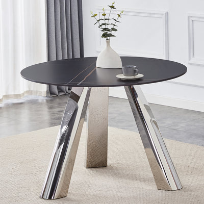 Une table ronde en acier inoxydable à motif de pierre brûlante de 42 pouces avec pieds convenant à 2, 4 ou 6 personnes