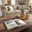 Table basse blanche, décor de livre à couverture rigide moderne avec chaise et œuvre d'art de parfum pour tablettes et manteaux