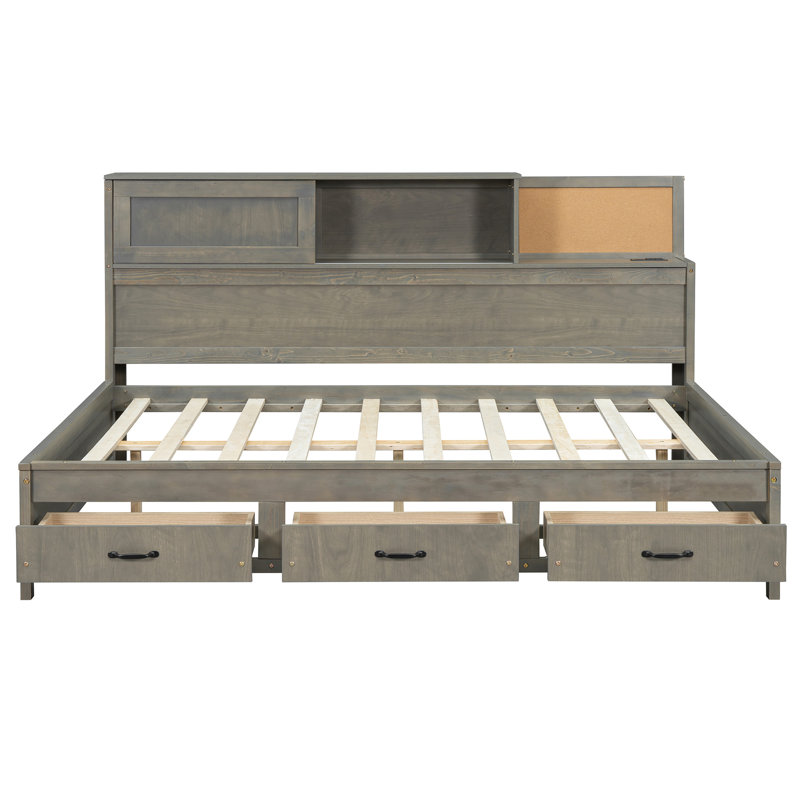 Lit de jour pleine grandeur en bois de couleur grise, livré avec 3 tiroirs de rangement, une tête de lit moelleuse et des prises pratiques pour une fonctionnalité mobile, une tablette et des appareils Tech intégrés