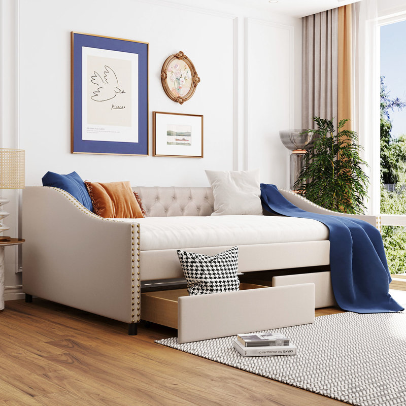 Lit de jour avec deux tiroirs en beige doux et construction en lattes de bois robustes - Apportez une atmosphère paisible à votre espace de vie et une structure résiliente