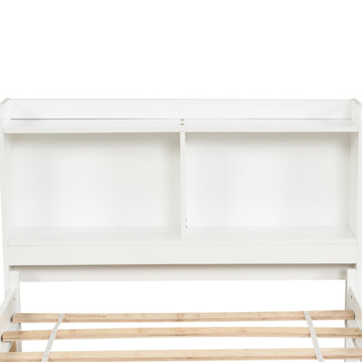 Lit double blanc élégant avec lit gigogne et bibliothèque - Rehaussez le décor de votre chambre. Tête de lit de rangement pour un charme accru.