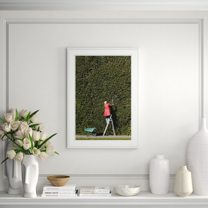 Woman Cutting Large Hedge Giclee Print by Getty Images