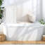 Meuble-lavabo blanc peu encombrant avec lavabo en céramique, rangement moderne pour les salles de bain compactes