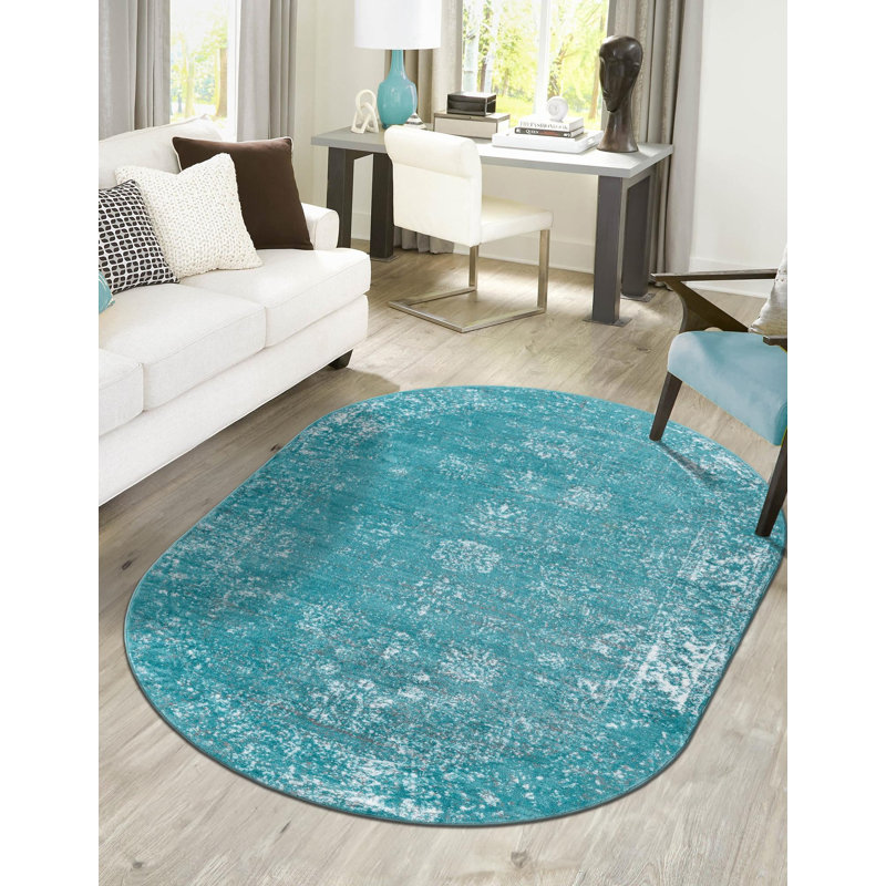 Tapis floral turquoise Brandt, Ovale 7 pi 10 po x 10 pi
