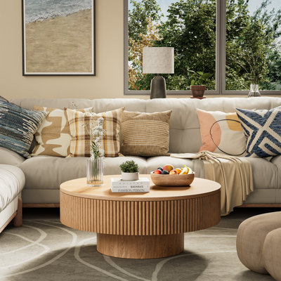 35" wide solid oak circular coffee table with solid wood and wax wood design.