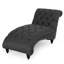 Chaise longue avec motif courbé et capitonnage à boutons, coutures en losanges, revêtement en tissu gris anthracite, capitonnage aux pieds en bois de bouleau et forme confortable, tissu