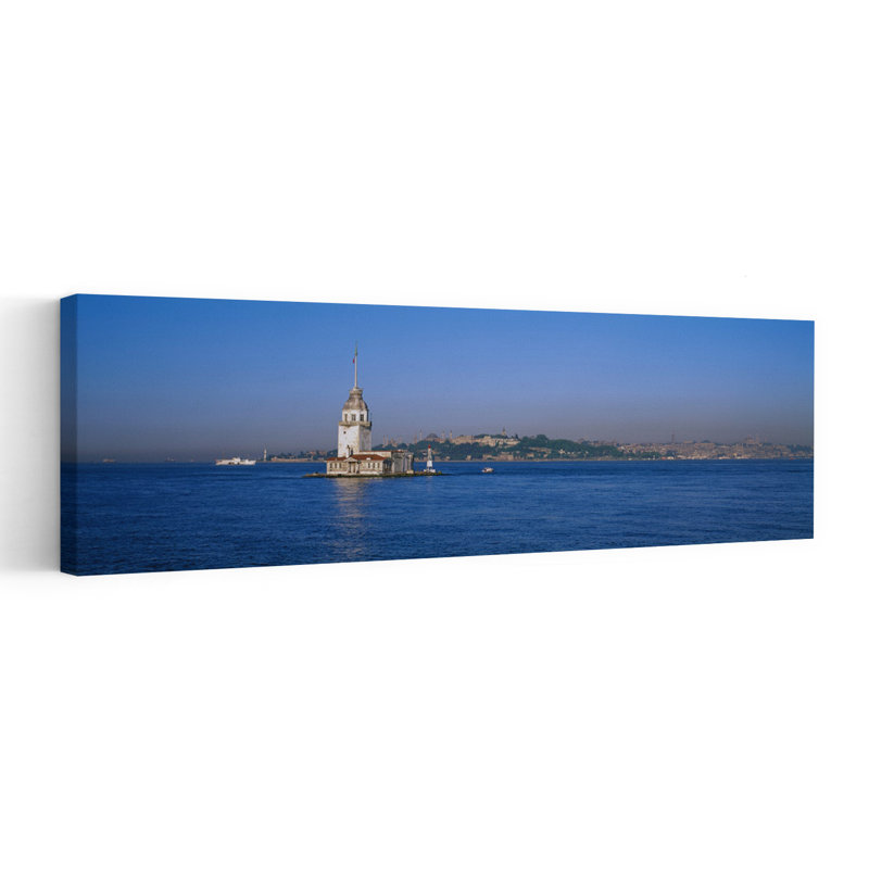 Lighthouse In The Sea With Mosque In The Background Leander's Tower Blue Mosque Istanbul Turkey by Murat Taner - Wrapped Canvas Panoramic Print