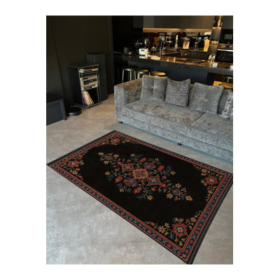 Tapis noir tissé lavable Mosso