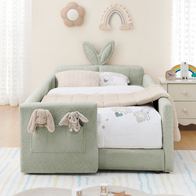 Structure de lit simple rembourré Boucle, conception, fonctionnalité et rangement pour oreilles de lapin, cyan pour utilisation dans la chambre à coucher avec matériau, tête de lit en forme de garde-corps, garde-corps, pochette de rangement, utilisation
