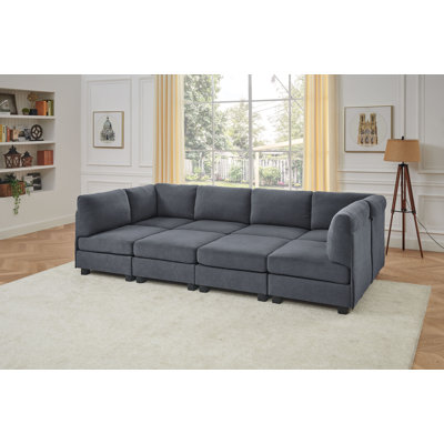 Dawnelle 120" Wide Symmetrical Modular Sectional with Ottoman