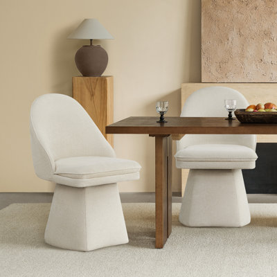 Chaise pivotante rembourrée en tissu