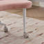 Fauteuil de bureau rose à roulettes assis-debout avec roulettes - conçu pour les personnes ayant un trouble d'hyperactivité avec déficits de l'attention (TDAH), il dispose d'un soutien lombaire et d'un tabouret à hauteur réglable, offrant des sièges flexibles pour un bureau à domicile.