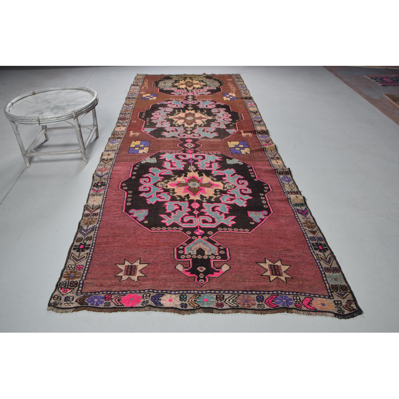 Tapis turc de style bohémien avec des couleurs riches et des motifs complexes pour la décoration intérieure