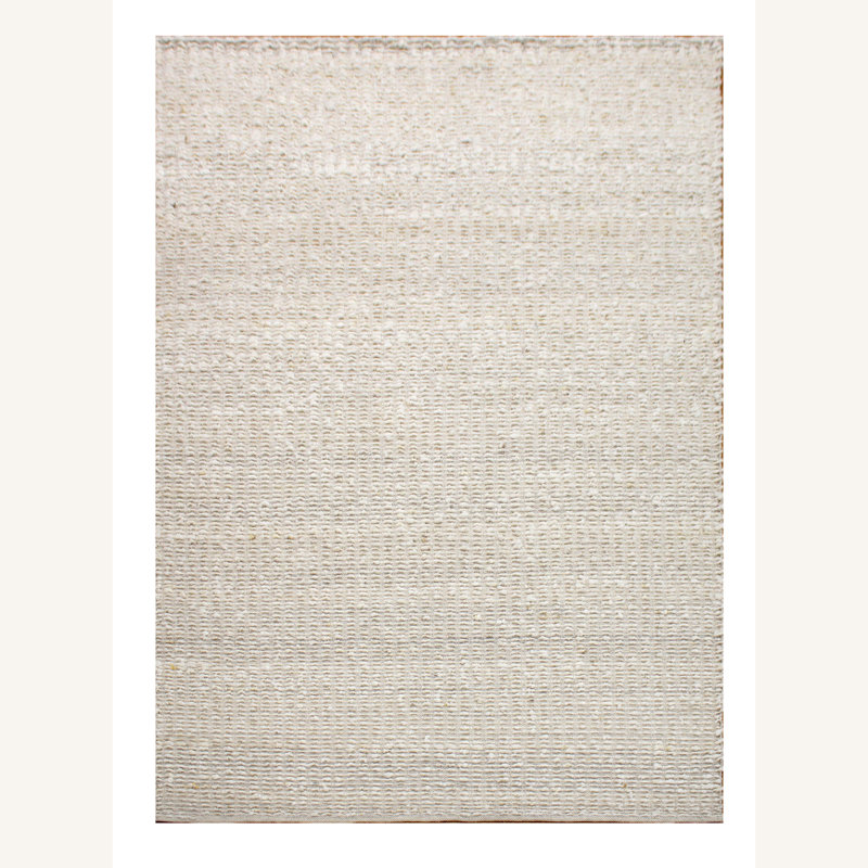 Tapis rectangulaire en laine de couleur unie à la main ivoire Caela, Rectangle 6 pi x 9 pi
