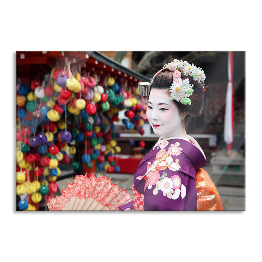 Glasbild Anmutige Geisha mit Fächer