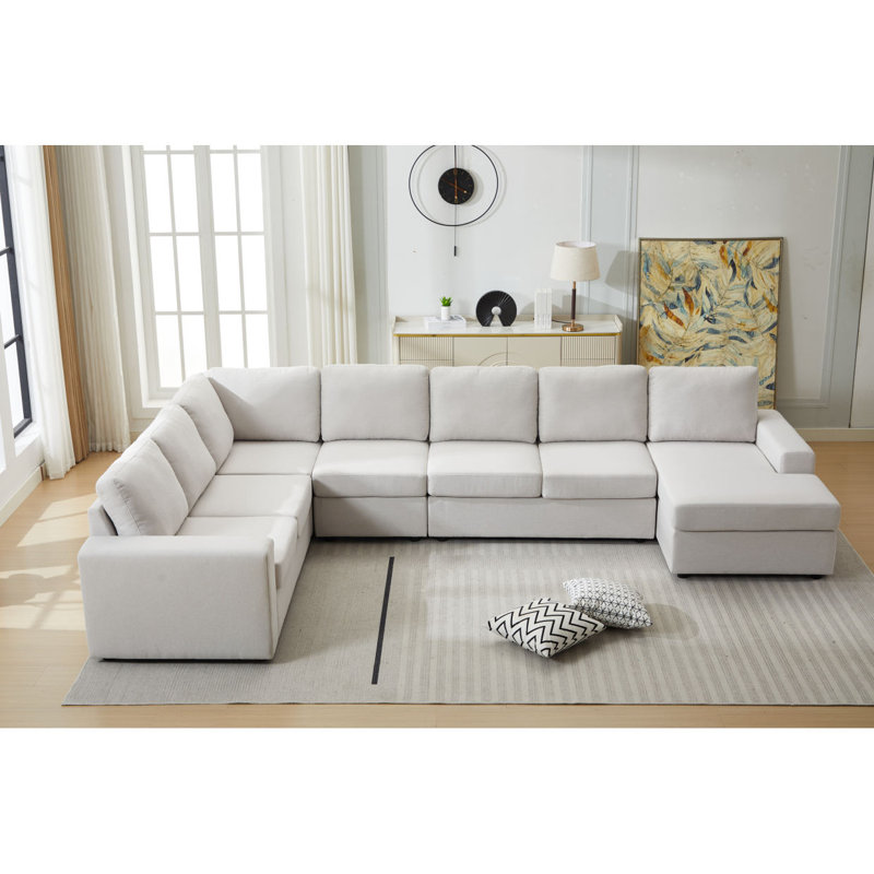 Grand ensemble de canapé modulaire en forme de L avec composants amovibles, revêtement confortable et jetés décoratifs pour les intérieurs contemporains