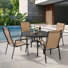 Ensemble repas 5 pièces pour patio avec trou pour parasol et chaises empilables en textilène