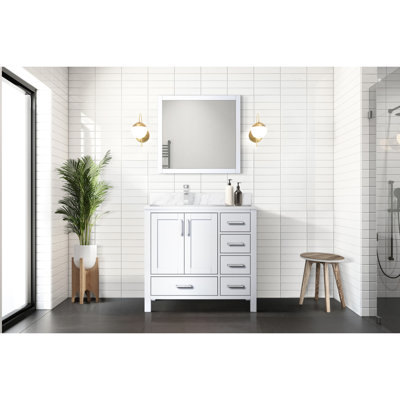 Meuble-lavabo blanc de 36 pouces de largeur avec comptoir en marbre gauche décalé, robinet en acier inoxydable, fonction de fermeture en douceur et compartiments de rangement intérieurs. L x P 22 po pour robinet de salle de bain inclus