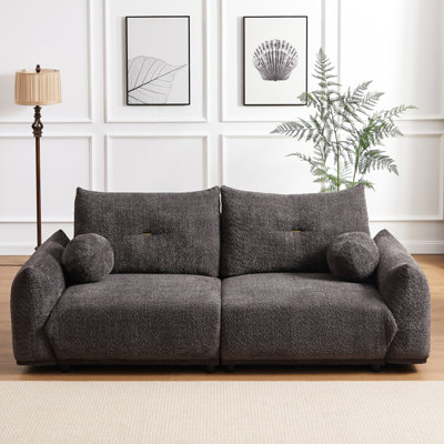 Confortable et décoratif, le mobilier de chambre à coucher en laine d'agneau gris polyvalent avec coussins
