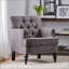 Fauteuil club capitonné