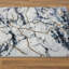 Tapis abstrait en polypropylène tissé à la machine en ivoire / gris / brun Madilin-261191310
