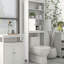 Au-dessus de la toilette avec 2 portes et tablette de rangement