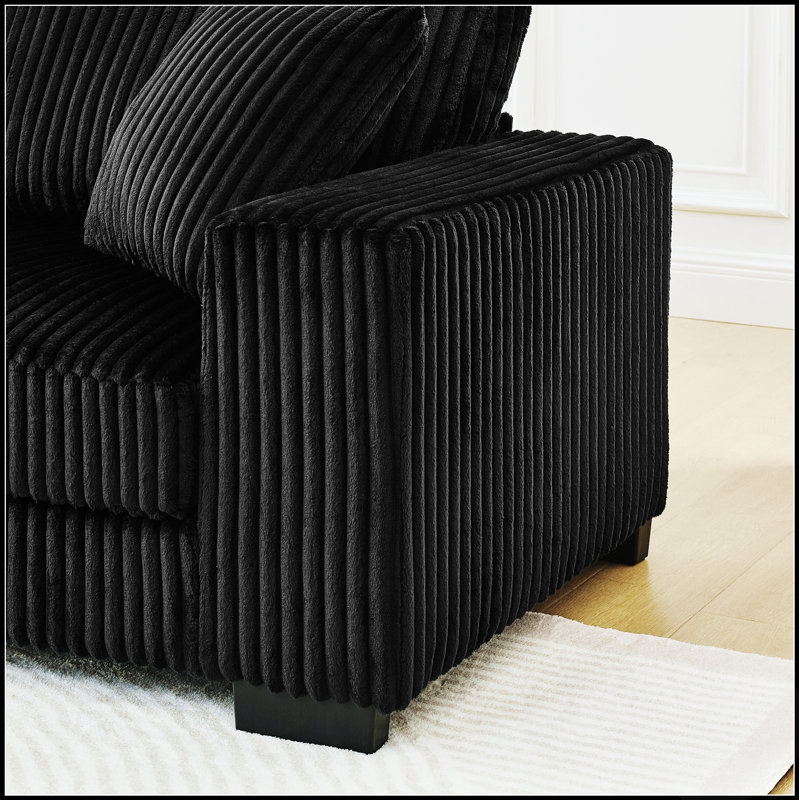 Canapé d'angle convertible en lit capitonné en velours côtelé, en forme de L, avec repose-pieds modulable et positionnable.