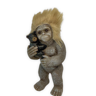 Blond Bigfoot and Bear Cub