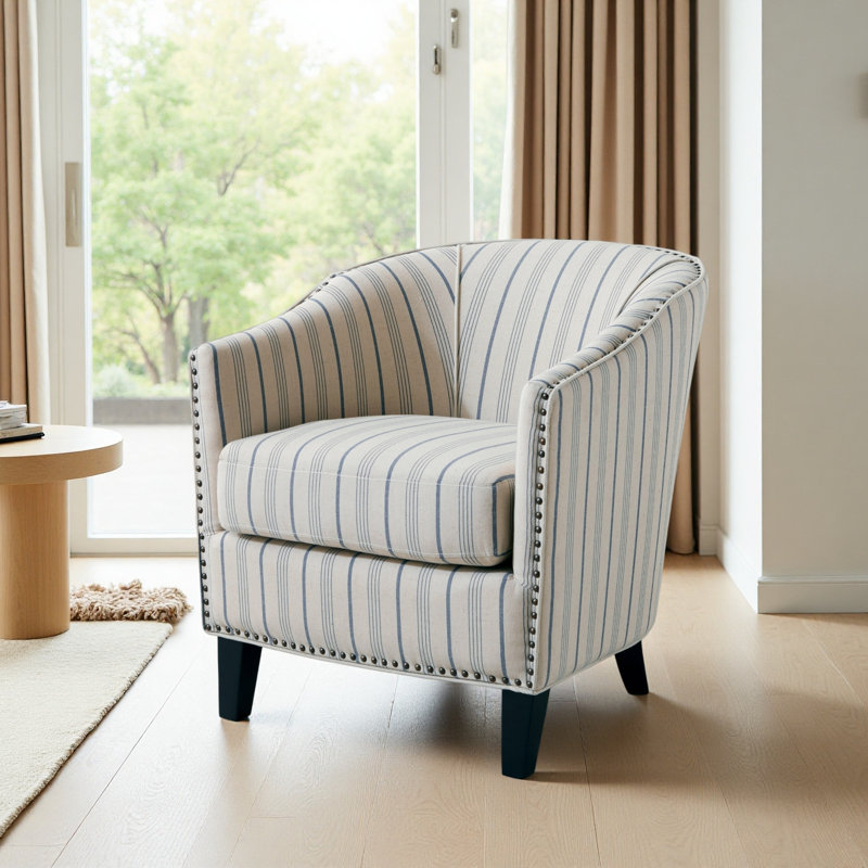 Fauteuil demi-tonneau rembourré à rayures