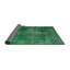 Tapis vert à motif abstrait-592215265