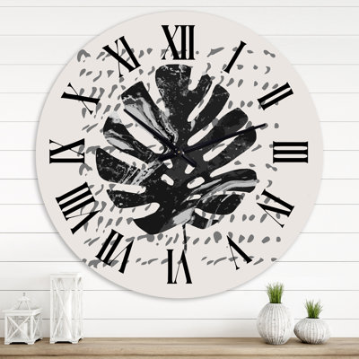 Minimaliste feuille de palmier tropical sur une texture grunge - horloge murale tropicale