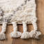 Tapis beige en laine à motif géométrique Powell-948310429