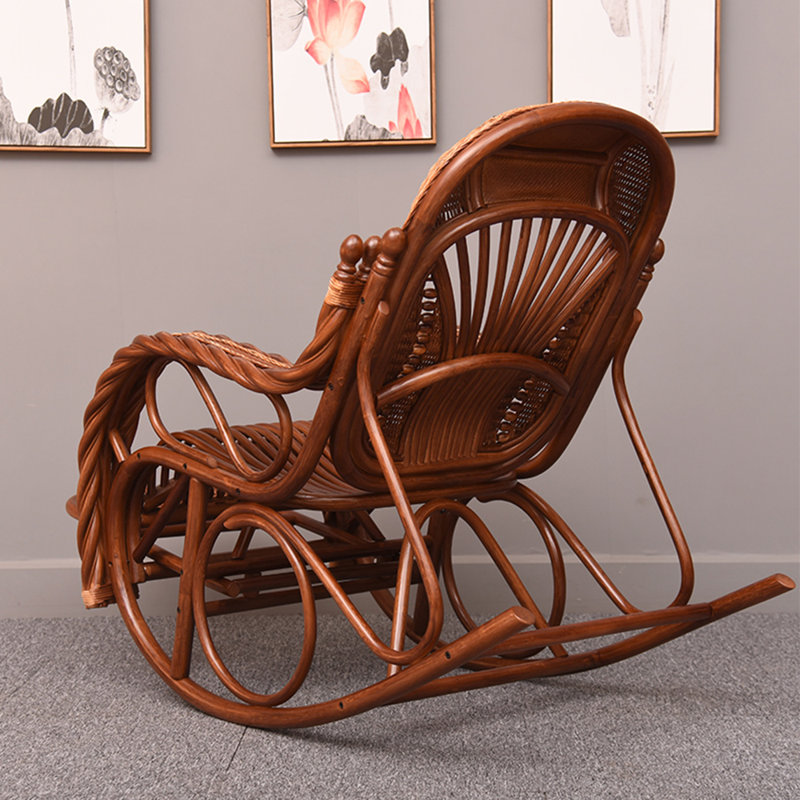 Chaise berçante en rotin naturel tissé