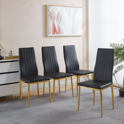 Ensemble de quatre chaises de salle à manger confortables au savoir-faire exquis, idéales pour améliorer votre expérience culinaire et ajouter de l'élégance à votre espace.