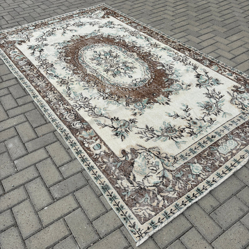 Tapis en laine beige élégant Elegant
