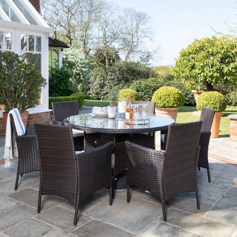 Dubose 6 - Person Wicker Patio Dining Set with Round Table , Cushions Included, No, Black