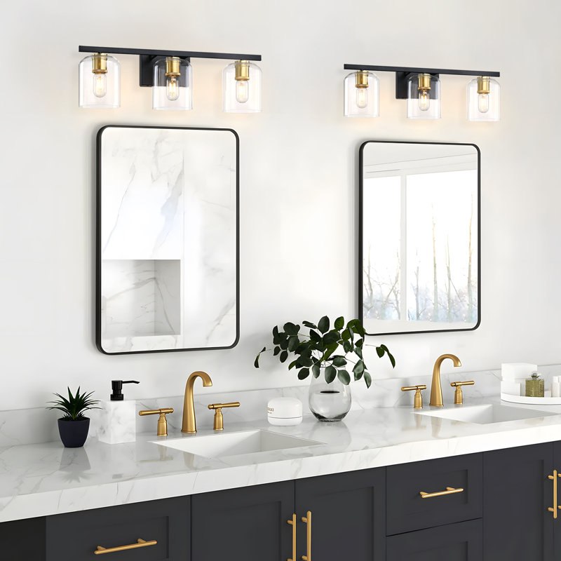 Éclairage pour salle de bain 3 lumières 25,5 po à deux tons noir et or doux avec douilles décoratives rétro et abat-jour en verre transparent