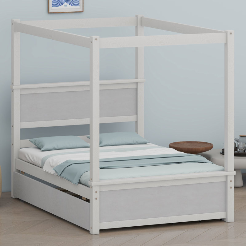 Le lit plateforme à baldaquin avec lit gigogne et tiroirs offre un rangement peu encombrant et un style moderne personnalisable