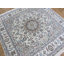 Tapis fin ivoire noué à la main 6 pi 9 po x 6 pi 9 po Dain