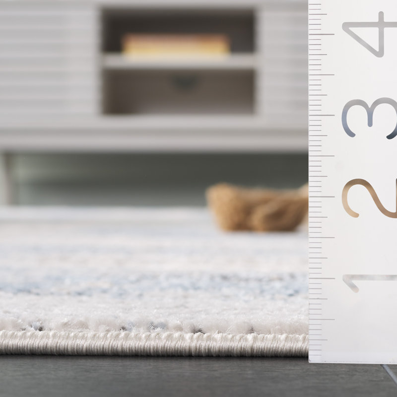 Ivory and Blue Abstract Stain-Resistant Rectangular Rug