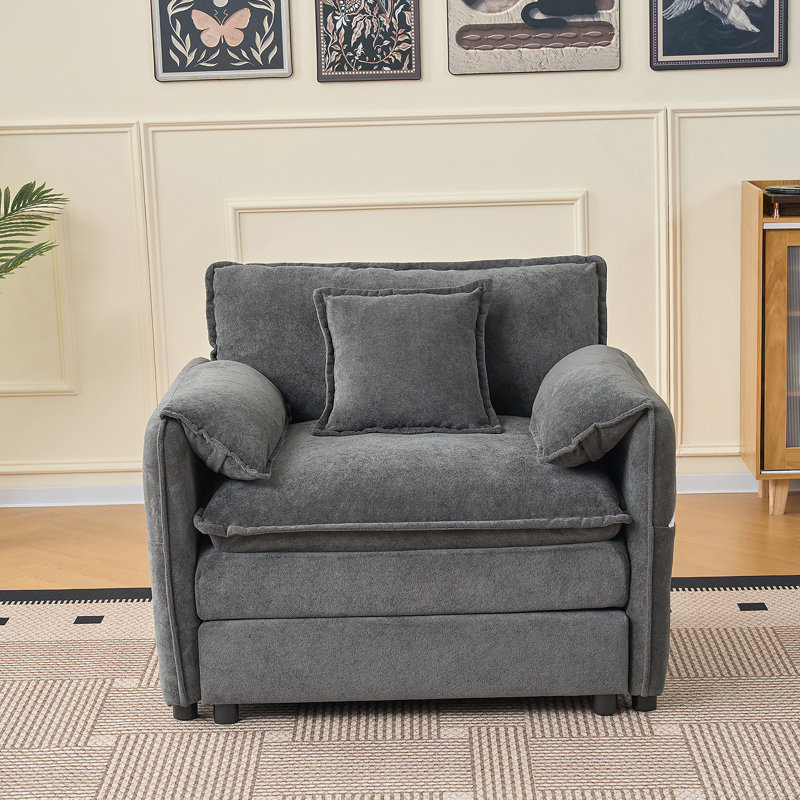 Fauteuil modulaire surdimensionné en chenille avec assise profonde, coussin décoratif et conception modulaire personnalisable pour le salon ou la chambre à coucher.