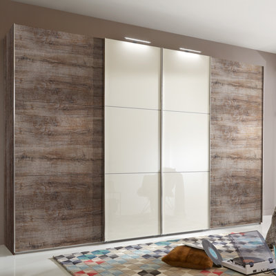 Caouette 4 Door Manufactured Wood Wardrobe