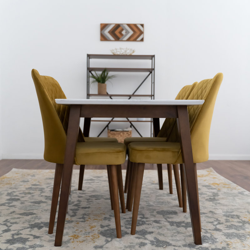 Ensemble de salle à manger en bois massif à 4 places avec chaises rembourrées en velours Fredy, Doré