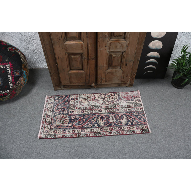 Handwoven Traditional Turkish Rug Exhibiting Rich Red and Blue Motifs Perfect for Entryways