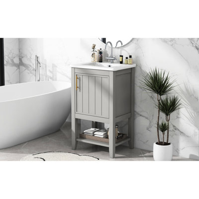 Meuble-lavabo de 20 po avec lavabo en céramique blanche, porte à fermeture douce, charnières en acier inoxydable et design fonctionnel contemporain