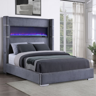 Grand lit tapissier Haven Gray avec boîte à flamme intégrée, alliant confort et ambiance personnalisable