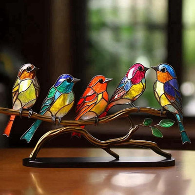 Figurine d'oiseau en acrylique sur une branche