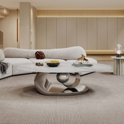 Table basse en marbre avec base sculpturale en acier inoxydable