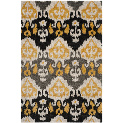 Tibetan Black/Gold/Gray Area Rug